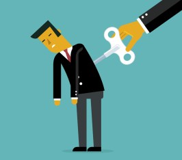 Businessman with wind-up key